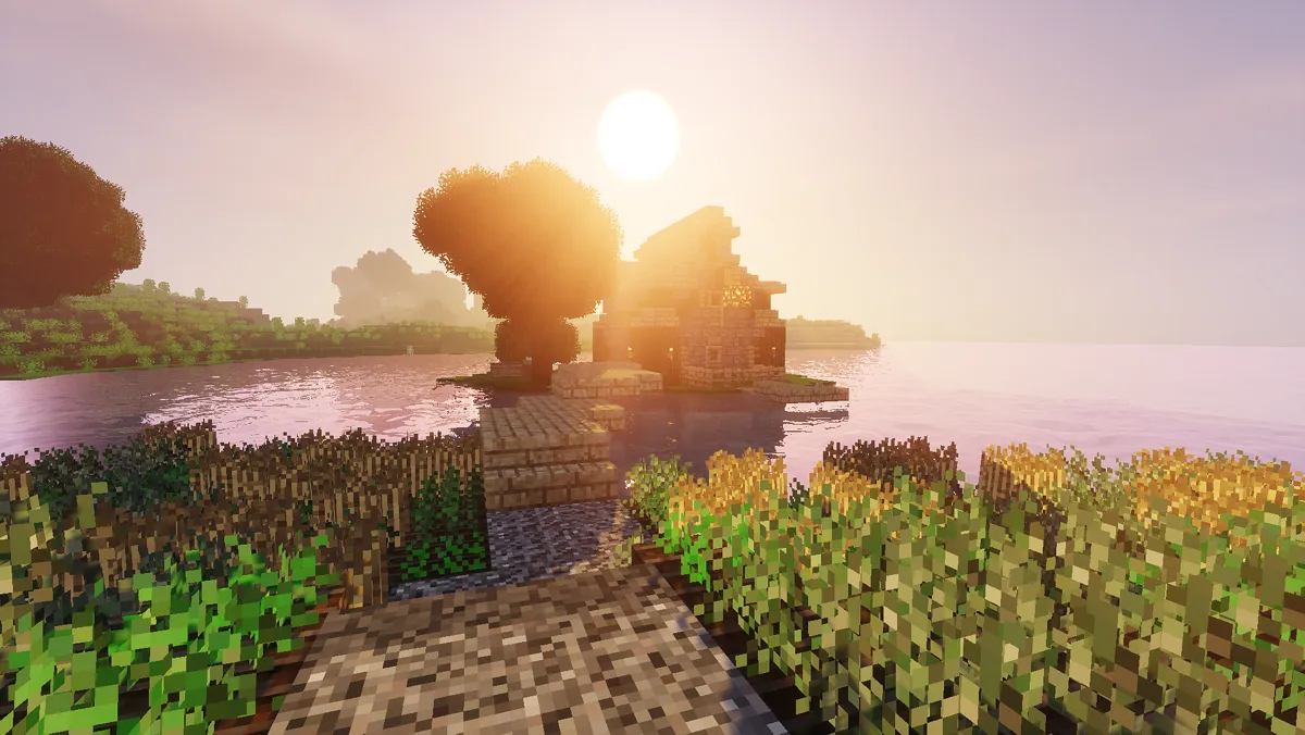 A Minecraft house on a lake at sunset